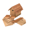 Assembled wooden birdhouse with shingled roof and unassembled flat wood pieces for kit assembly