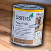 Open can of Osmo Polyx-Oil used for finishing butcher block countertops.