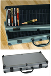 Open and closed views of a custom pen carry and display case with foam slots holding pens in a workshop setting